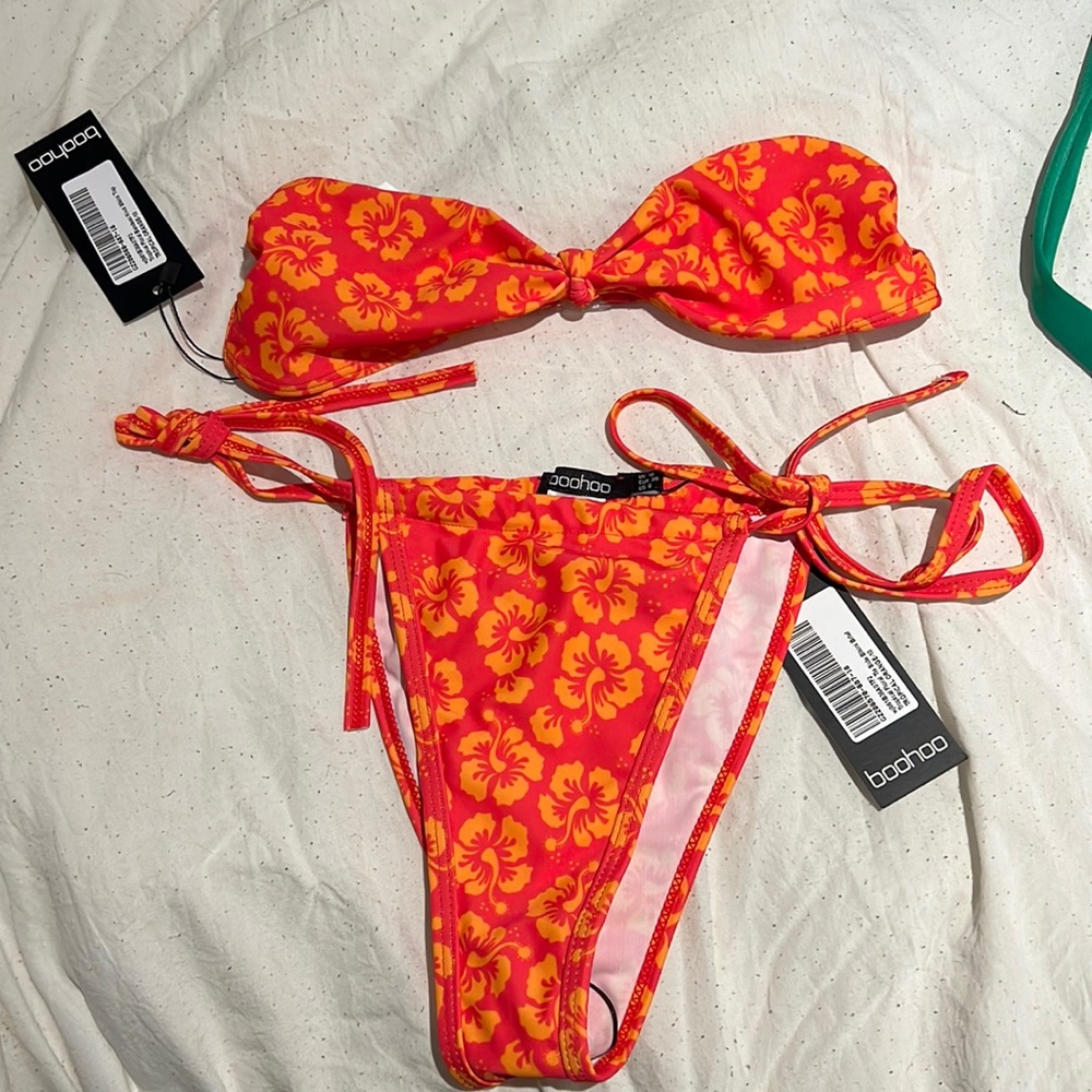 Brand new orange and red bikini. Top was too small super cute and comfortable.